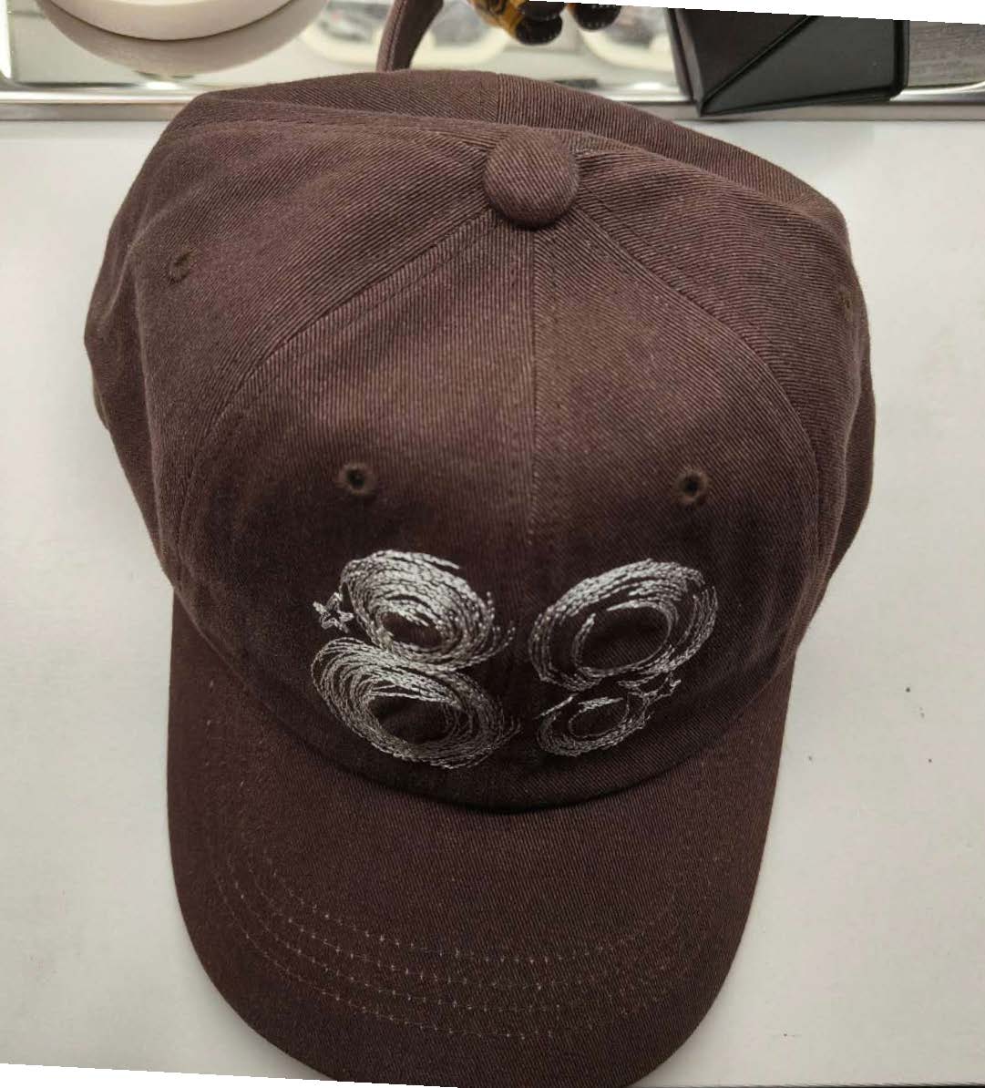 This is a front view photo of a hat